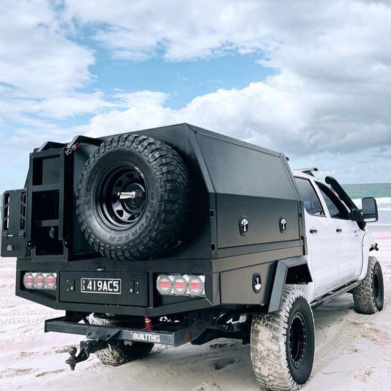 N70 Toyota Hilux custom tray and canopy with Spare wheel mount, ladder and Jerry Can Holder accessories fitted